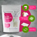 Bolsa blanca de quitamanchas en polvo de 300 gramos, con diseño rosa e íconos de lavado, ideal para ropa de color, blanca, textiles y alfombras.