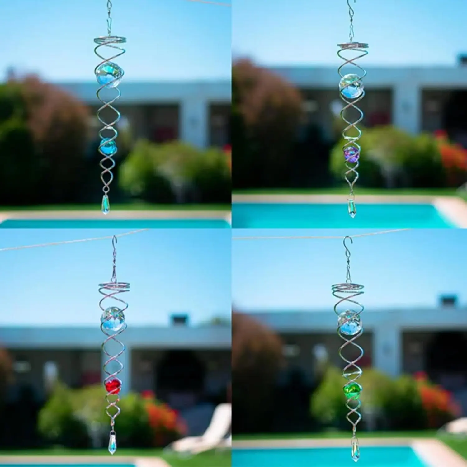 Cuatro espirales decorativas de metal colgadas al aire libre sobre una piscina, cada una con esferas de cristal facetado en colores diferentes: azul, morado, rojo y verde.