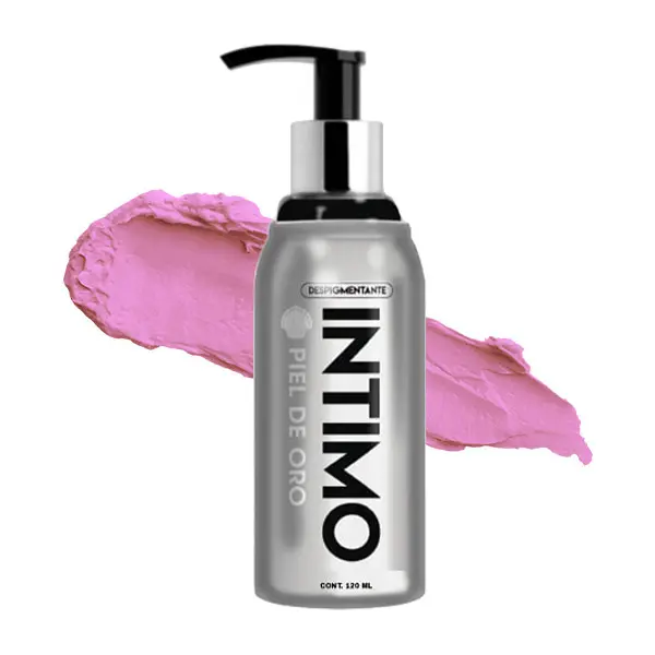 Frasco dosificador plateado de despigmentante Íntimo de 120 ml con textura cremosa rosa claro extendida detrás.
