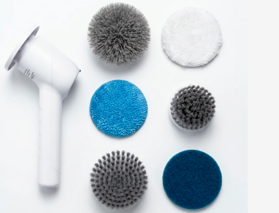 Cepillo eléctrico giratorio inalámbrico blanco con seis cabezales intercambiables de diferentes texturas y colores para limpieza profunda