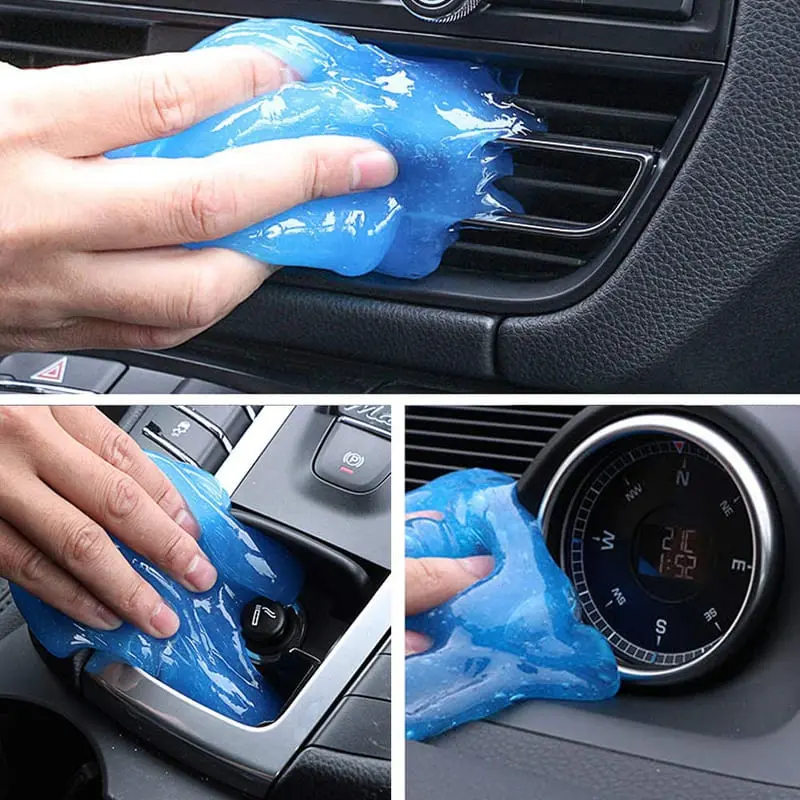 Gel limpiador adhesivo azul moldeable aplicado en rejillas, consola y reloj de tablero de un automóvil para atrapar polvo.