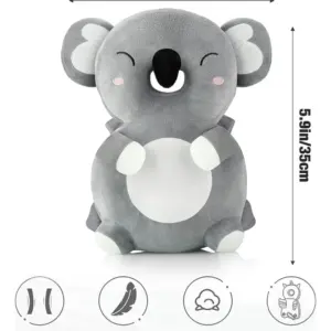 Almohada anticaída para bebé diseño koala gris de 18x35 cm, hecha en suave terciopelo con correas elásticas para proteger cabeza y espalda al caminar.