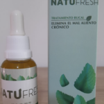 Frasco gotero de 30 ml con líquido amarillento y caja azul con motivos de menta. Tratamiento bucal Natufresh para el mal aliento crónico.