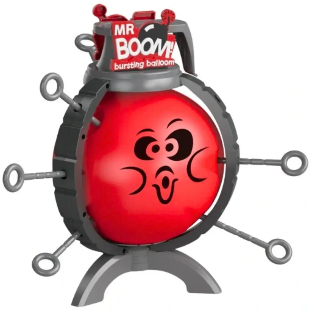 Juego de mesa Mr. Boom con globo rojo inflado, sujeto por un marco gris con pasadores insertados, sobre una base de soporte para fiestas infantiles.
