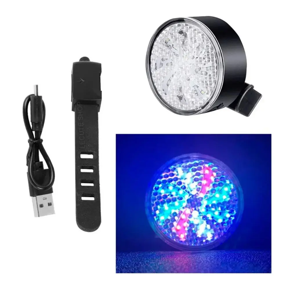 Luz trasera para bicicleta con cable USB y correa. Muestra el dispositivo negro apagado y encendido con destellos de colores azul, rosa y blanco.