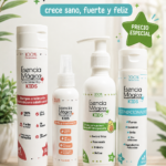 Kit capilar infantil de cuatro piezas sobre repisa de madera. Incluye shampoo, tónico, crema para peinar con aguacate y acondicionador.