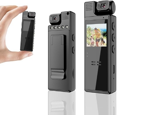 Mini cámara de seguridad negra con clip trasero, pantalla a color, lente giratorio y luces LED para grabación de video y audio.
