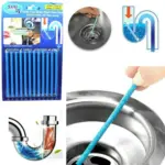 Empaque de barras enzimáticas azules para limpieza de tuberías y prevención de obstrucciones con imágenes de uso en lavaplatos.