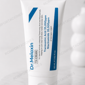 Tubo blanco de crema facial Dr Melaxin TX-Cream de 60 ml con detalles en azul sobre superficie marmoleada.
