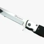 Cuchillo de bolsillo plegable de acero inoxidable con hoja plateada y mango bicolor negro y blanco con diseño ergonómico.