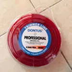 Carrete de nylon rojo Dontus para desbrozadora, de 3.3 mm de diámetro, 46 m de largo y sección redonda, en empaque plástico transparente.