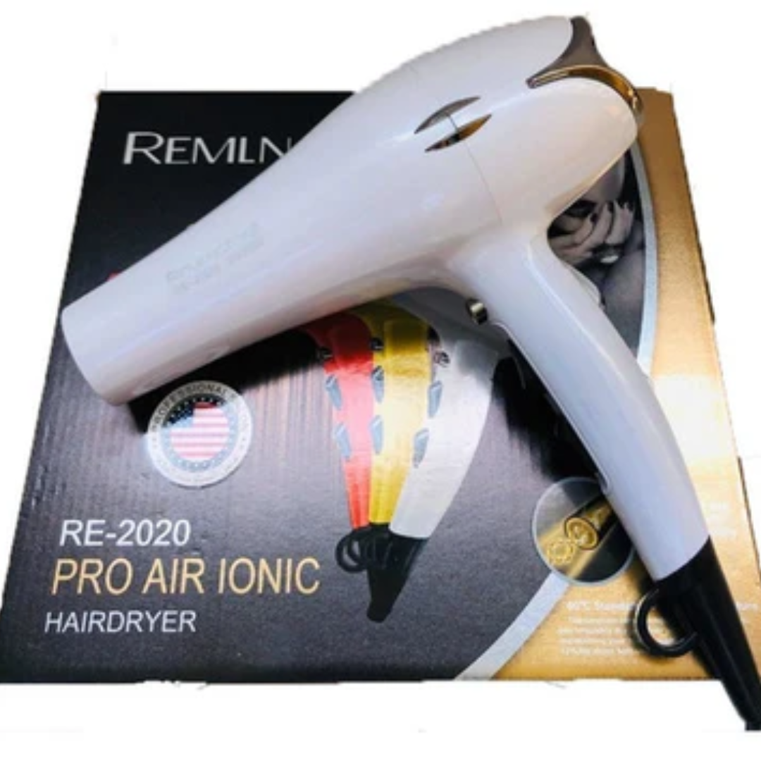 Secador de cabello profesional blanco Pro Air Ionic modelo RE-2020 apoyado sobre su caja negra y dorada con detalles a color.