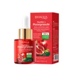 Frasco de sérum facial rojo con gotero dorado y su caja de empaque con ilustraciones de granadas, 30 ml.
