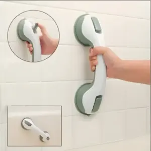 Barra de seguridad para baño blanca y verde con ventosas. Muestra uso vertical en ducha y una variante horizontal sobre azulejos blancos.