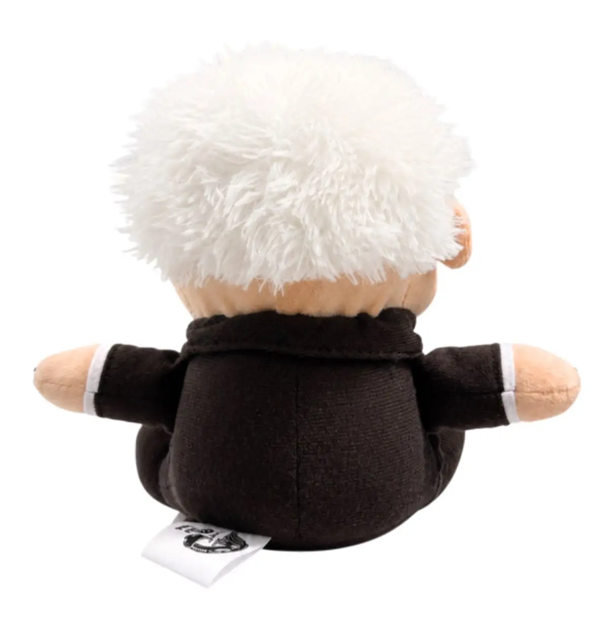 Peluche coleccionable del abuelo vista trasera, cabello blanco despeinado, traje negro con puños blancos y etiqueta visible.