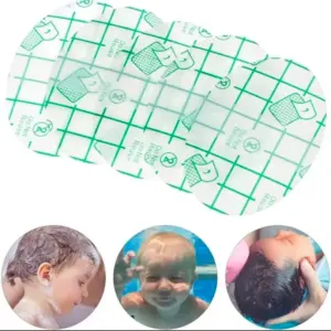 Pack de parches transparentes circulares con cuadrícula verde para proteger oídos de bebés del agua en la ducha y piscina