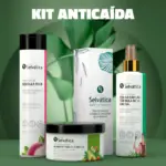 Kit anticaída capilar sobre fondo verde con champú de cebolla roja de 300 ml, tónico y mascarilla nutritiva para el crecimiento del cabello.