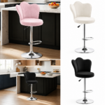 Banco alto tipo tulipán acolchado en rosa, blanco y negro. Base cromada ajustable con reposapiés, en ambiente de cocina y fondo blanco.