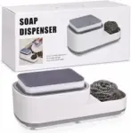 Dispensador de jabón blanco con base transparente, esponja gris y estropajo metálico, junto a su caja de empaque.