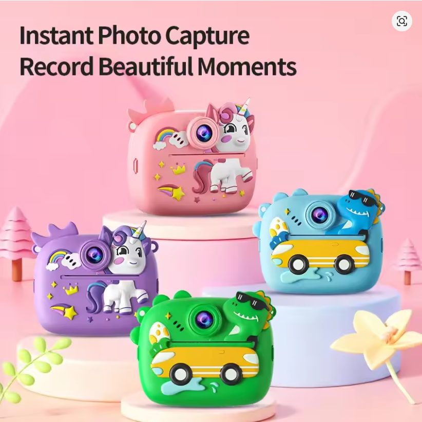 Cámara infantil de impresión instantánea portátil disponible en colores rosado, morado, azul y verde con diseños de unicornio y dinosaurio en relieve.