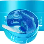Dos tarros azules con mascarillas de hidrogel para ojos dispuestas en capas, acompañadas por una espátula transparente.