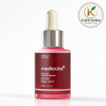 Serum facial reafirmante Medicube EGF NAD de 30 ml en frasco rojo degradado con gotero metálico, diseñado para elasticidad de la piel.