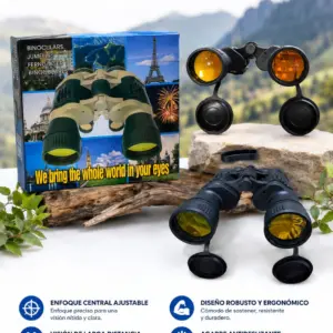 Binoculares A603-275 con enfoque central, cuerpo negro texturizado y lentes amarillos, presentados junto a su caja, tapas protectoras y fondo natural.