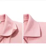 Detalle de cuello de camisa polo color rosa con protector adhesivo aplicado, mostrando la textura del tejido y la protección contra manchas de sudor.