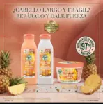Kit capilar Garnier Fructis Hair Food Piña Anti-quiebre con champú, acondicionador y mascarilla junto a piñas frescas sobre superficie jaspeada.