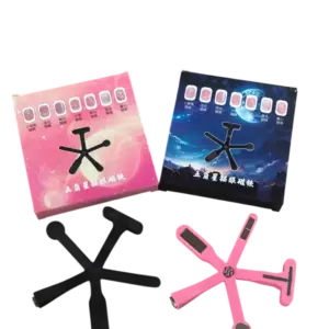 Dos cajas con imanes negros y rosados en forma de estrella de cinco puntas para efectos en uñas.