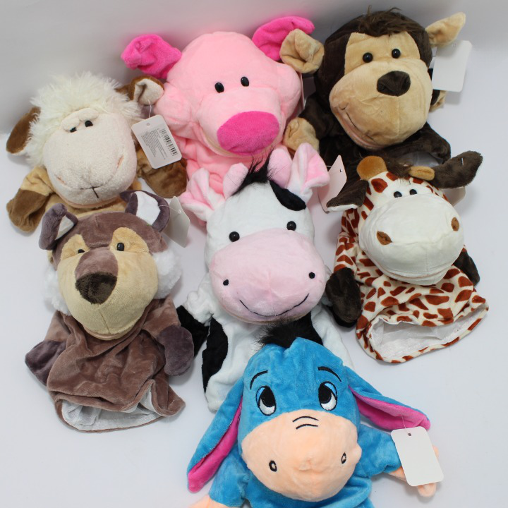 Set de siete títeres de mano de peluche con diseños de animales surtidos, suaves y coloridos para niños.