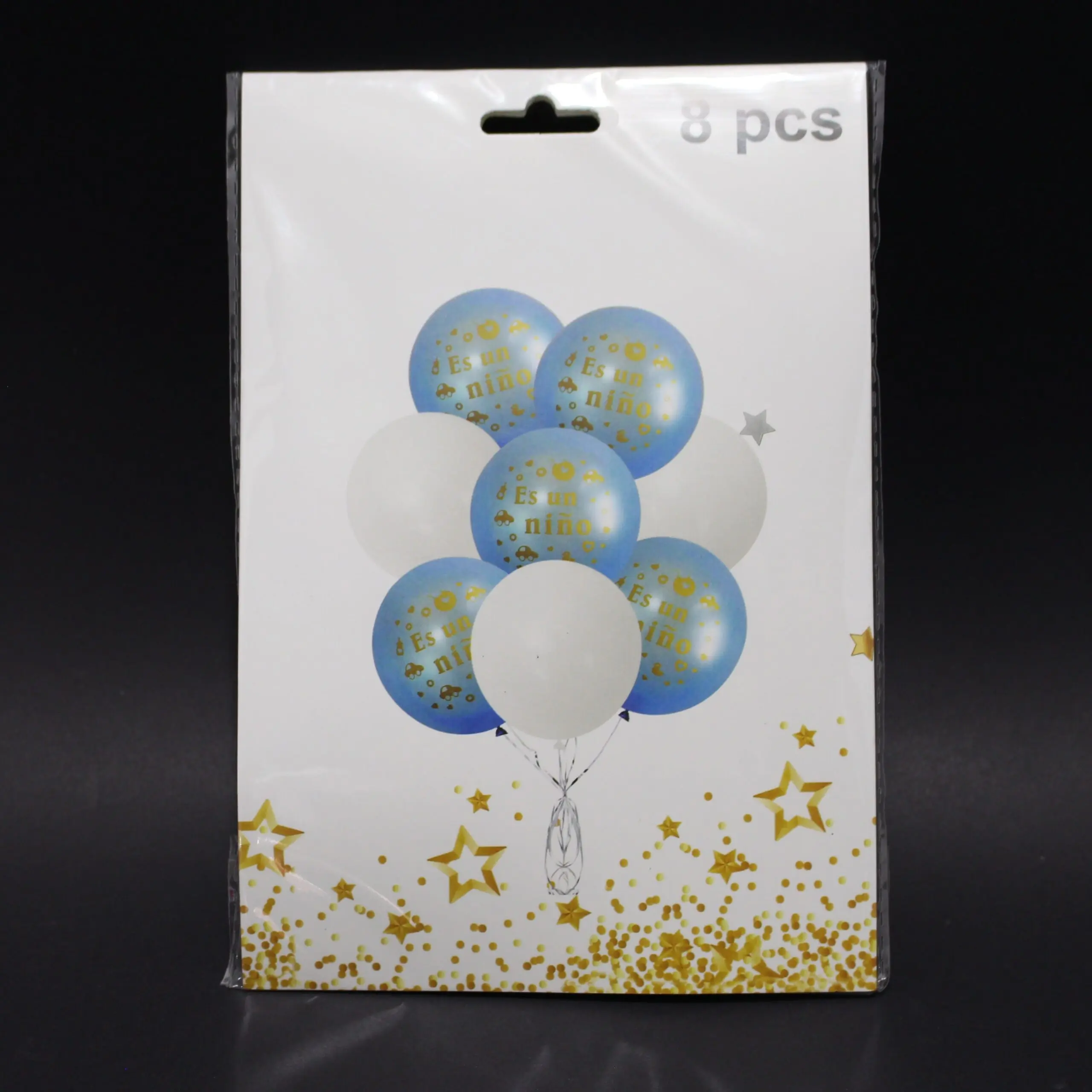 Set de 8 globos para revelación de género en empaque con diseño de globos azules con texto dorado y globos blancos con estrellas doradas.