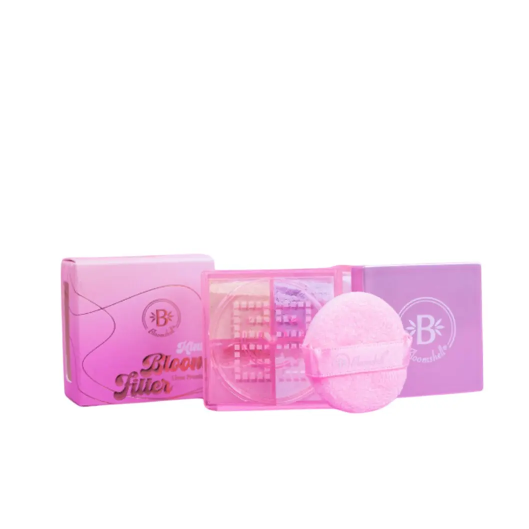 Polvo suelto compacto mini de cuatro tonos con estuche rosa, esponja aplicadora y caja exterior a juego.