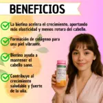 Mujer sonriendo sostiene frasco rosa de gomitas Nature's Bounty Hair Skin Nails junto a naranjas y texto de beneficios.