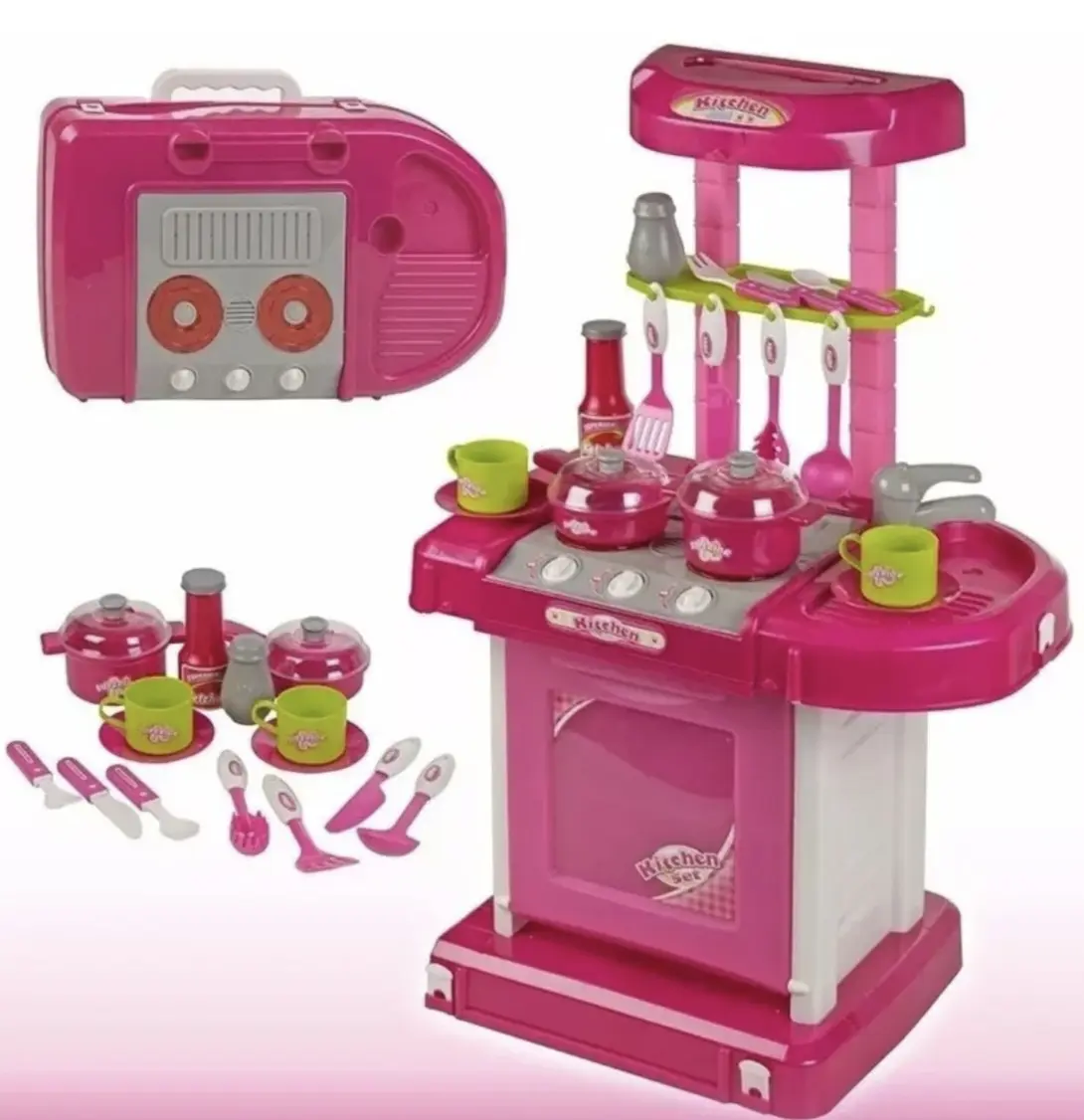 Cocina de juguete rosa y blanca con accesorios, convertible en maleta portátil, incluye ollas, tazas, utensilios y estufa con mandos.