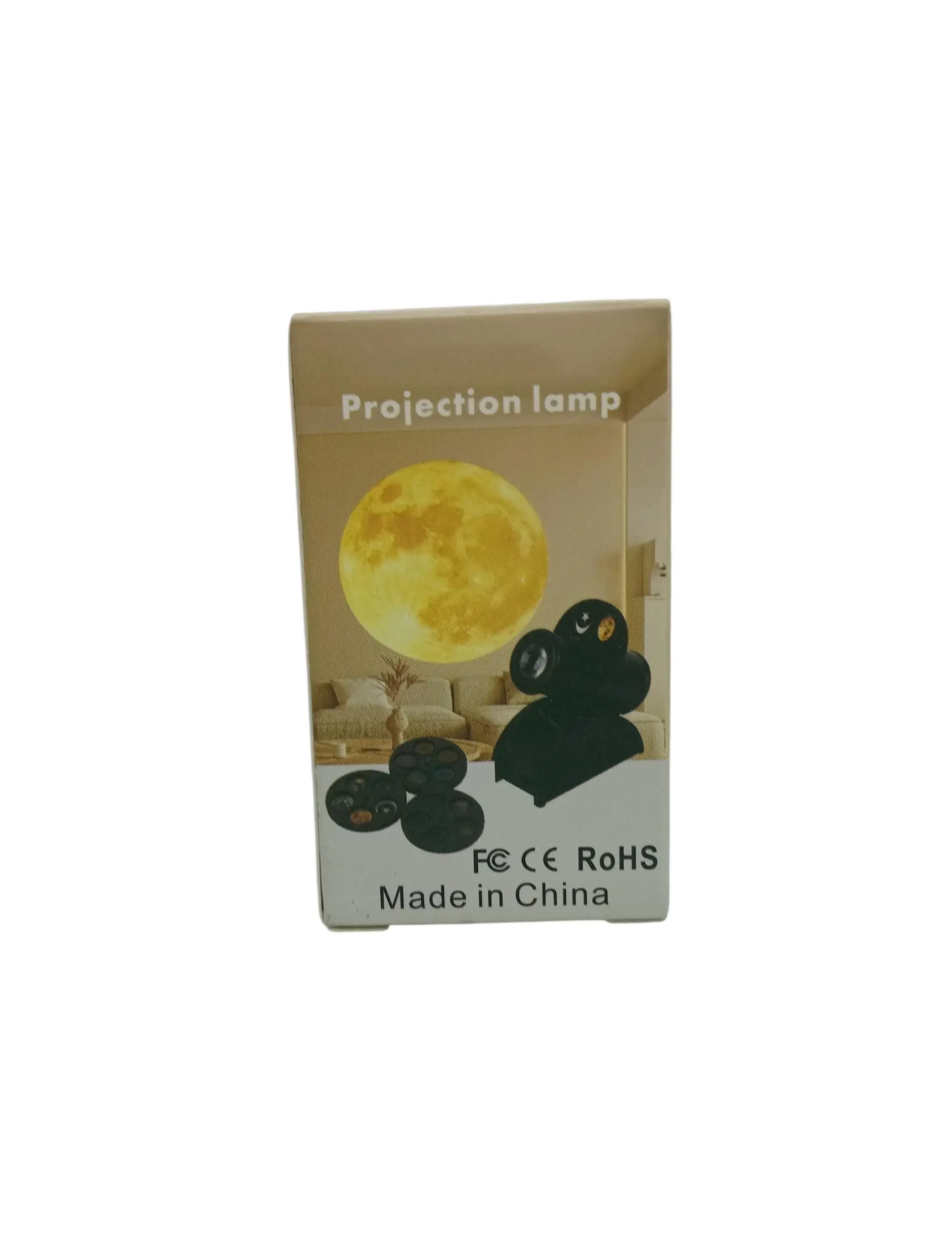 Empaque de proyector de estrellas y planetas con diseño de luna amarilla, dispositivo negro y tres discos de proyección intercambiables.