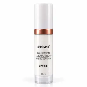Frasco dosificador blanco de 30 ml de base de maquillaje color changing con SPF 50 y anillo metálico cobrizo.