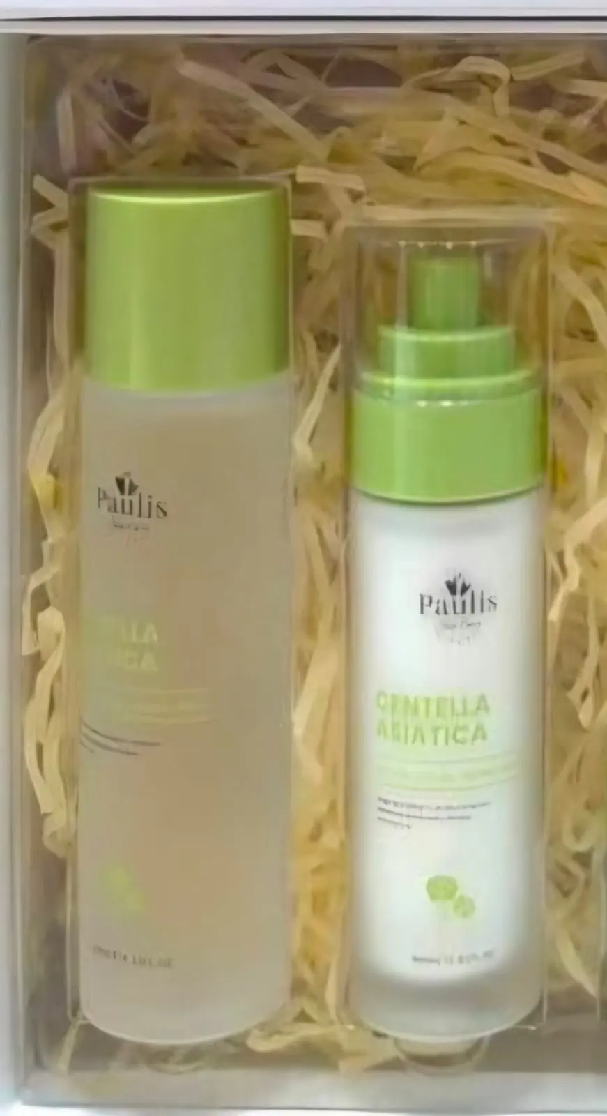Kit facial Centella Asiática en caja con papel picado, incluye tónico hidratante de 150 ml y emulsión reparadora de 100 ml con dispensador verde.