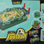Empaque de mesa de futbolín portátil verde con azul, incluye accesorios, diagrama de montaje y medidas de 55cm por 26cm por 20.8cm para juego rápido.