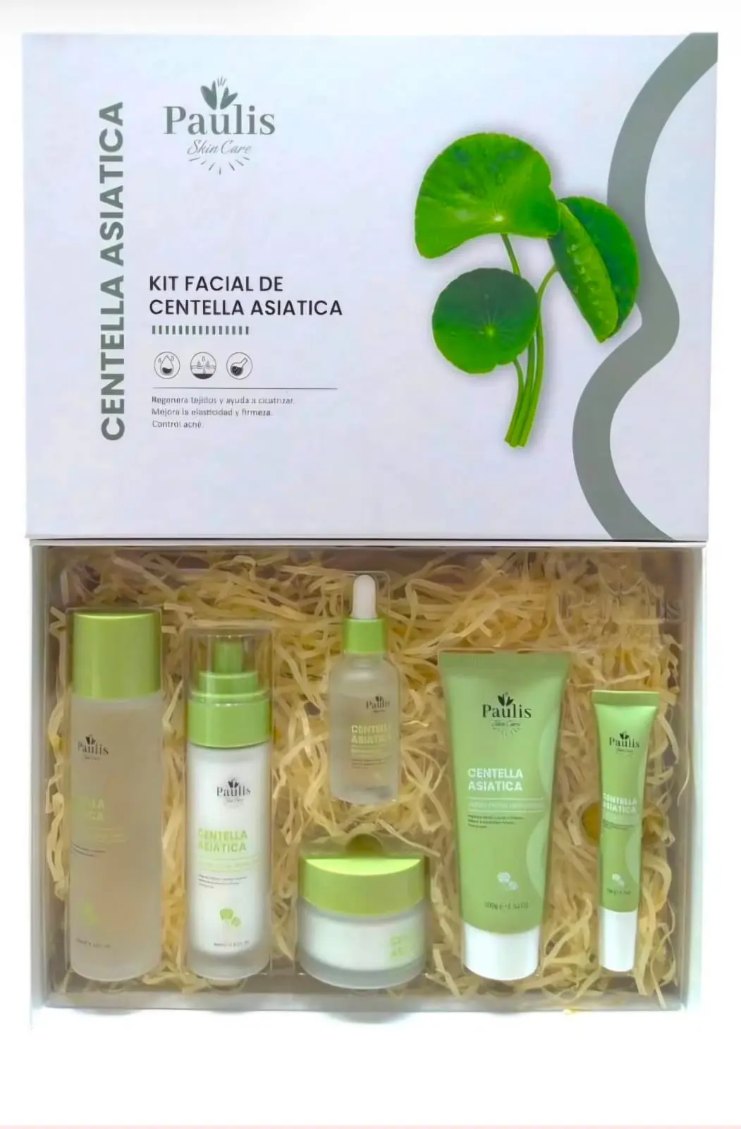Kit facial de Centella Asiática en caja blanca con paja, que incluye tónico, sérum, crema y otros productos para el cuidado de la piel.