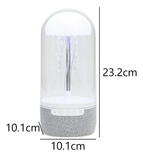 Lámpara LED con medusa flotante, base gris texturizada de tela y parlante bluetooth integrado. Dimensiones: 23,2 cm de alto por 10,1 cm de diámetro.