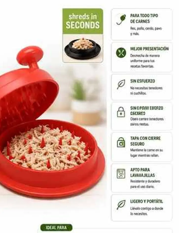 Rallador y molino manual rojo para desmechar carne con tapa de puas internas y base circular antideslizante sobre mesa blanca