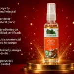 Aceite vegetal crudo de coco en spray presentación de 60 ml sobre base dorada con seis sellos informativos laterales en fondo rojo brillante.